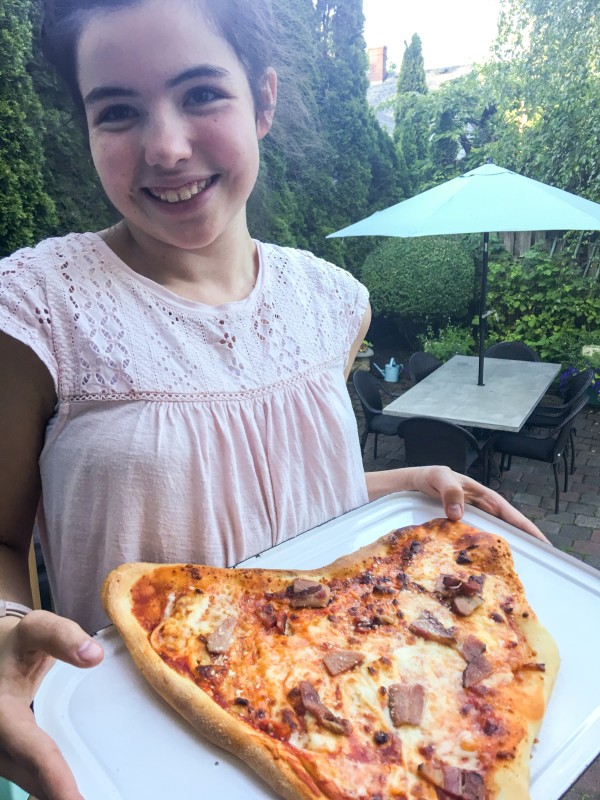 Charlotte with Pizza