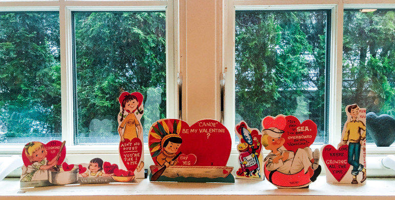 Vintage Valentines Day cards in window