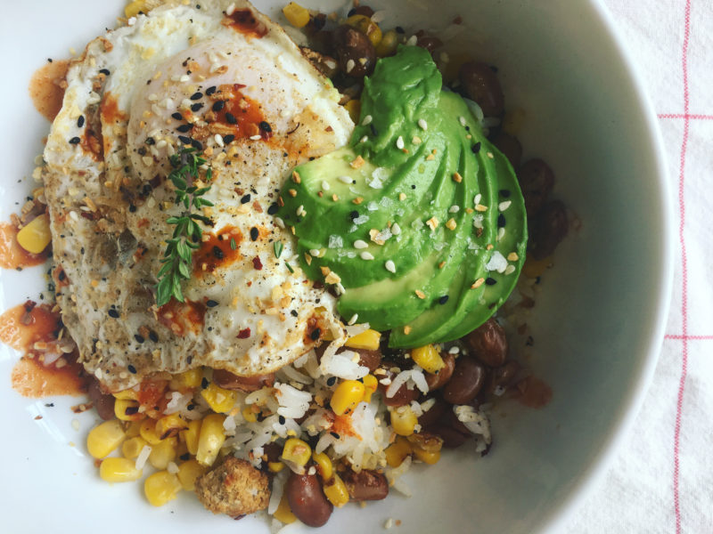 rice bowl with beans, egg,avocado, corn